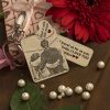 Customized couple photo keychain made of brass with engraved personalized message – ideal gift for anniversaries in Nepal.